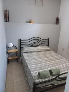 Postel nebo postele na pokoji v ubytování Kaza Jindung