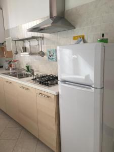 Kuchyňa alebo kuchynka v ubytovaní B & B 21 Bologna