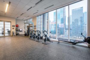 a gym with treadmills and cardio equipment in a building at Streeterville 1br w lounge terrace n Navy Pier CHI-1000 in Chicago