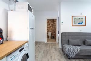 Kuchyň nebo kuchyňský kout v ubytování Fantastic & Functional apartment in Malaga II