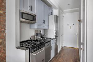 A cozinha ou cozinha compacta de East Village 2br w wd nr union square NYC-1260