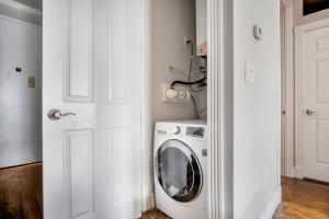 a laundry room with a washer and dryer at East Village 2br w wd nr union square NYC-1260 in New York