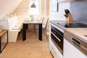 Dapur atau dapur kecil di Strandgut Wohnung 9