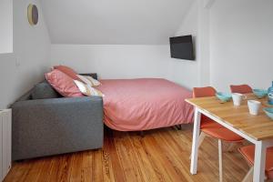 Postel nebo postele na pokoji v ubytování L'Escale de la baie !