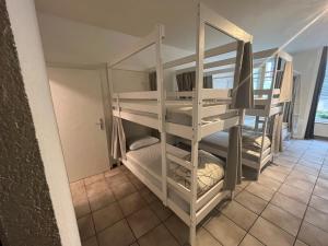 a bunk bed room with bunk beds in it at Auberge de jeunesse hyper centre de Neuchâtel in Neuchâtel