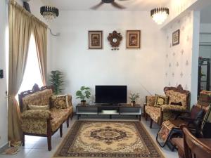 A seating area at Hulu Yam Musliim Homestay