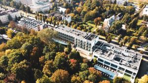 an aerial view of a building in a city at Apartamenty Ciechocinek SPA in Ciechocinek