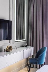 Μια τηλεόραση ή/και κέντρο ψυχαγωγίας στο Boulevard Residence 54