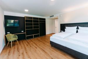 Katil atau katil-katil dalam bilik di Hotel Restaurant Krone
