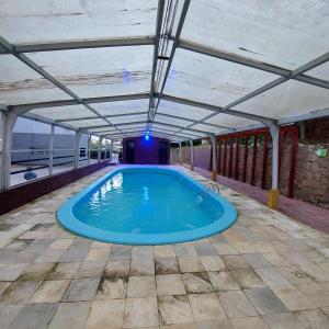 Πισίνα στο ή κοντά στο Residencial Ponta das Canas