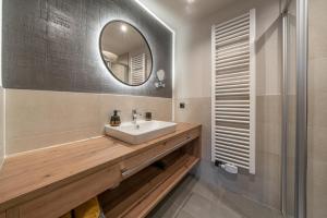 Kúpeľňa v ubytovaní Bergmomente Apartments