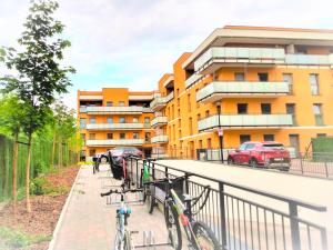a group of bikes parked next to a building at Apartament Garbary22 in Bydgoszcz