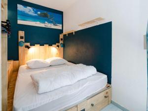 Giường trong phòng chung tại Appartement Narbonne-Narbonne Plage-Narbonne Plage, 2 pièces, 2 personnes - FR-1-409-25