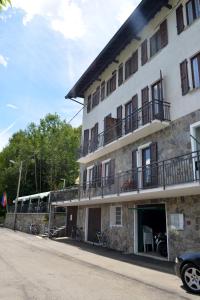 a building with bikes parked outside of it at Albergo Diana in Tronzano Lago Maggiore