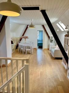 Ένα ή περισσότερα κρεβάτια σε δωμάτιο στο Dans Maison privée Appartement de charme, 70m2 avec pergola Et jardin à 20min MARCHE de NOEL de Strasbourg