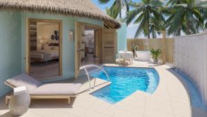 a villa with a swimming pool and a bedroom at Sandals Royal Curacao All Inclusive Couples Only in Nieuwpoort