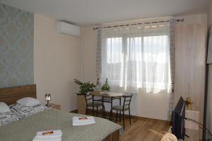 Posteľ alebo postele v izbe v ubytovaní The Budapest View Apartment