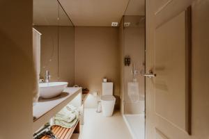 Um banheiro em Hotel da Oliveira