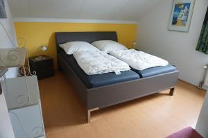 Postel nebo postele na pokoji v ubytování Kustverhuur, Park Scheldeveste , Schelde 095