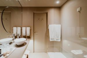 Um banheiro em Hotel da Oliveira