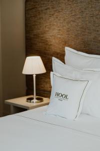 Postel nebo postele na pokoji v ubytování Hotel da Oliveira