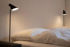 Postelja oz. postelje v sobi nastanitve Baccara Studio with Matterhorn view by Inspiring Places Zermatt