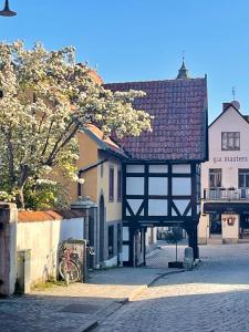 a building on the side of a street at Verkstan Hotel in Visby