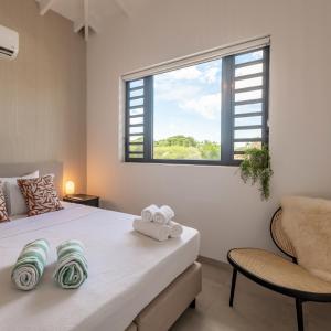 Krevet ili kreveti u jedinici u okviru objekta The Wave - Excellently located Penthouse with pool