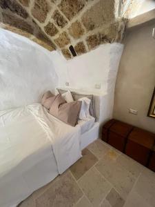 Postel nebo postele na pokoji v ubytování LA SEGRETA DEL CASTELLO, Private Access
