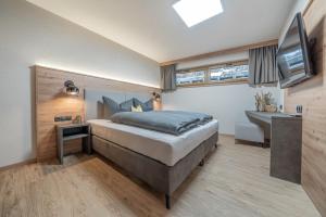 Posteľ alebo postele v izbe v ubytovaní Bergmomente Apartments