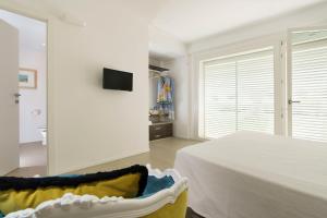 A bed or beds in a room at Meravilla