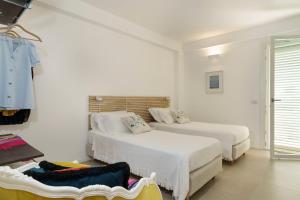 A bed or beds in a room at Meravilla
