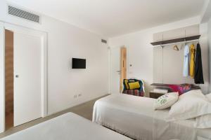 A bed or beds in a room at Meravilla