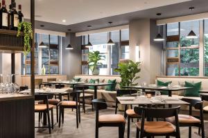 Un restaurant sau alt loc unde se poate mânca la Tapestry by Hilton Ambasciatori Hotel