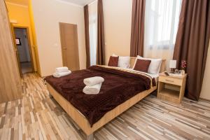 Postel nebo postele na pokoji v ubytování Hotel Hana + 37 fotografií