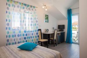 Posteľ alebo postele v izbe v ubytovaní Gabi Rooms & Studio Apartment