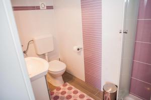 Kúpeľňa v ubytovaní Gabi Rooms & Studio Apartment + 37 fotografií