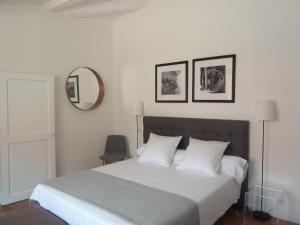 Katil atau katil-katil dalam bilik di Appartement Quartier Mazarin