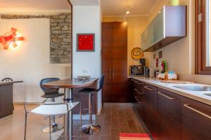 Cucina o angolo cottura di [Como-Blevio] Suite lake view + private garage
