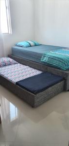 En eller flere senge i et værelse på Apartamento en Santa Marta con internet piscina + 15 billeder