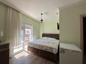 Postel nebo postele na pokoji v ubytování DR. GREENS + 21 fotografií