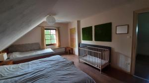 Voodi või voodid majutusasutuse Sunshine Villa Fonyódliget toas