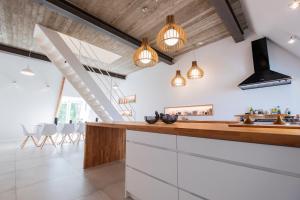 Kuchyň nebo kuchyňský kout v ubytování B&B Summertime