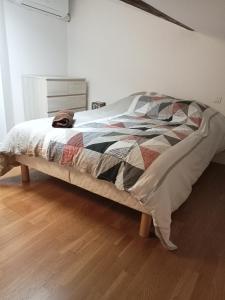 Llit o llits en una habitació de petit coin confort