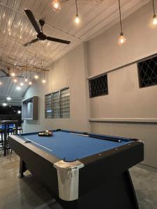 a pool table in a room with a ceiling at 5R4B 15Pax V KTV,KID'S POOL,POOL TABLE NEAR USM,LWE HOSPITAL,SPI ARENA in George Town