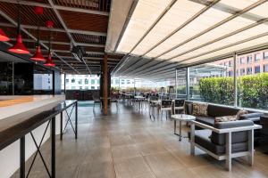 Posezení v ubytování Hotel 100 Luxury Suites by Preferred