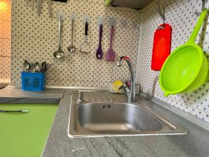 Kuchyň nebo kuchyňský kout v ubytování Amely Hostel