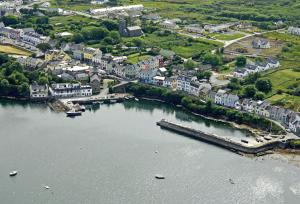 an aerial view of a town on a river at Roundstone Quay House in Roundstone