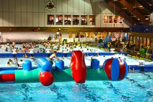 a large swimming pool with a large crowd of people at Memorial University in St. John's