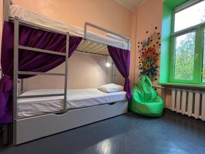 Postelja oz. postelje v sobi nastanitve Amely Hostel